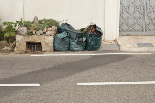 Modern Luton furniture disposal image with eco-friendly symbol.