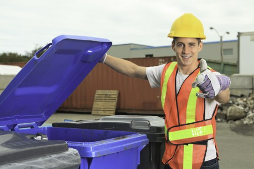 Staff member assisting a business with accessible waste service arrangements in Luton